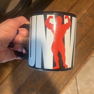 Universal Body Building Large Black Logo Mug w/yellow interior w/Red Male figure